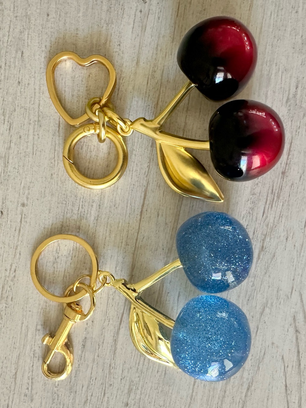 Choose One: Red or Blue Cherry Ball Bag  Charms